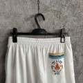 「#4484」CASABLANCA White shorts in silk jacquard with orange pattern