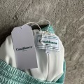 「#4501」CASABLANCA Light blue silk shorts with ripple pattern