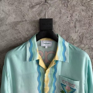 「#4502」CASABLANCA Light blue silk T-shirt with ripple pattern