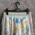 「#4517」CASABLANCA White linen shorts with totem pattern