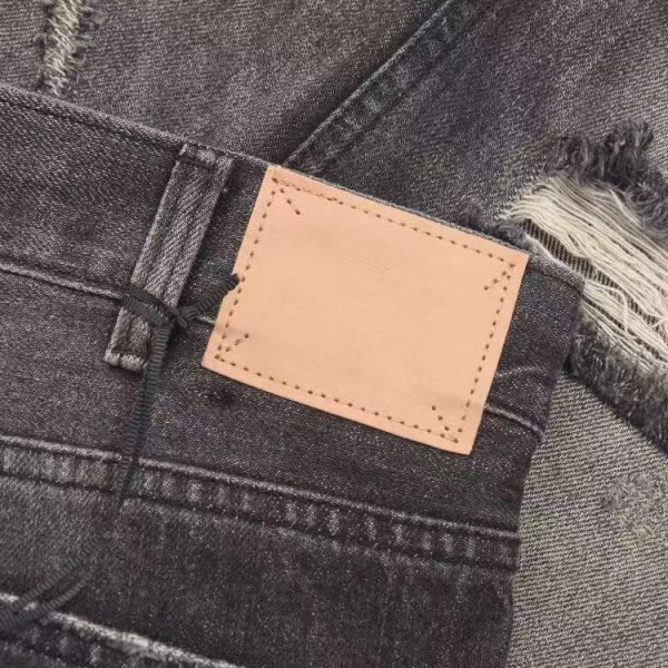 CELINE black washed jeans with holes