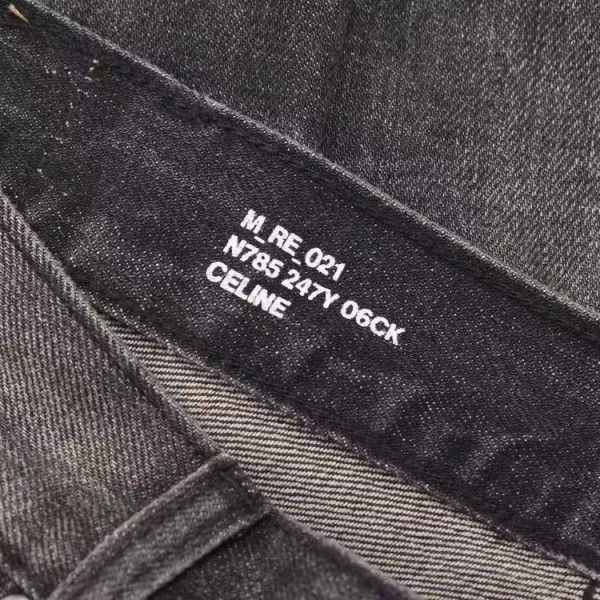 CELINE black washed jeans with holes