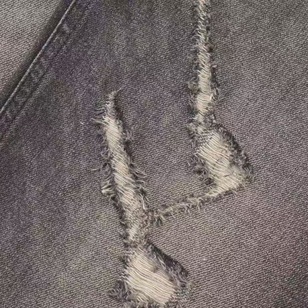 CELINE black washed jeans with holes