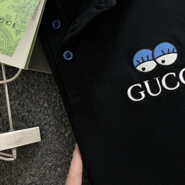 Gucci Floral neckline embroidered polo shirt with cartoon lettering