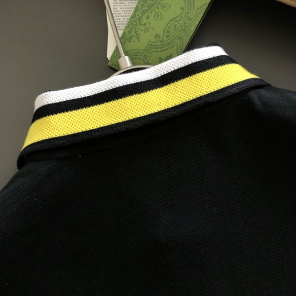 Gucci Floral neckline embroidered polo shirt with cartoon lettering