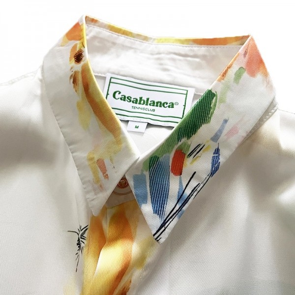Casablanca Dotted orange silk blouse with loose, thin sleeves