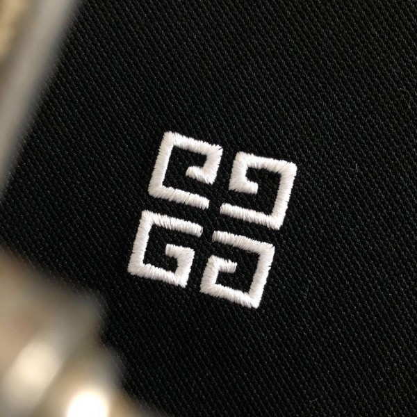 Givenchy Monochrome embroidered polo shirt with lapel
